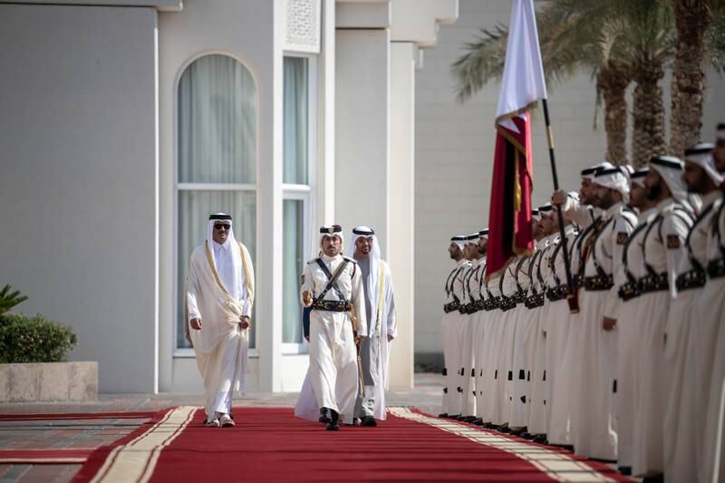 Sheikh Mohamed and Sheikh Tamim inspect the Qatar Guard of Honour. Rashed Al Mansoori / Presidential Court