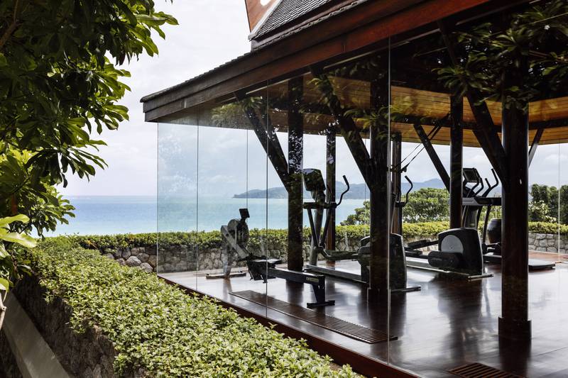 The glass-walled gym offers breathtaking views.