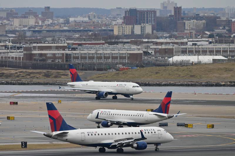 Delta Airlines planes taxi at LaGuardia in New York. AFP