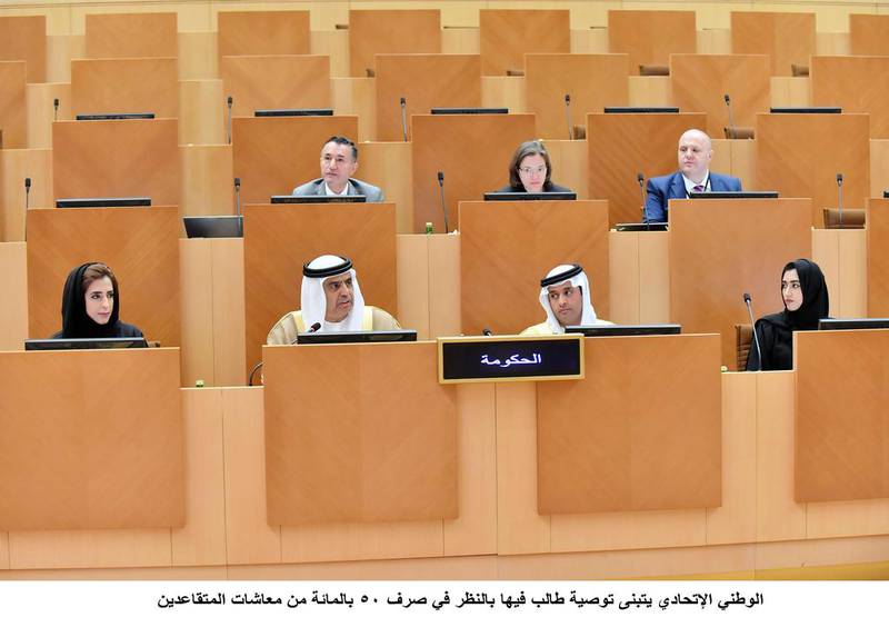 Obaid Al Tayer, Minister of State for Financial Affairs, (centre left) speaks on Wednesday as the Federal National Council approves a draft law that paves the way for value-added tax (VAT) and excise duties on selected items. Wam
