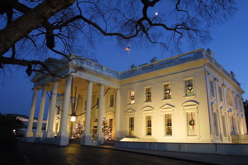 Christmas trees light up the North Portico of the White House on December 4, 2000. Newsmakers