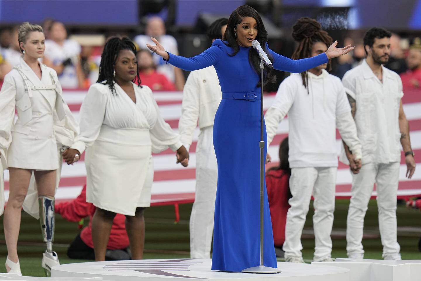 Country music artist Mickey Guyton performs the US national anthem before the NFL Super Bowl 56 football game. AP