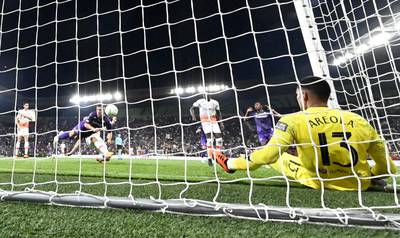 Fiorentina's Luka Jovic scores a goal that was later disallowed as West Ham United's Alphonse Areola attempts to save. Reuters