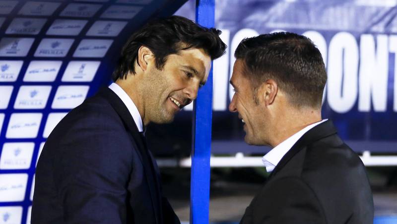 Real Madrid's new head coach Santiago Solari greets Melilla's coach Luis Miguel Carrion before the Spanish King's Cup fourth round match. EPA
