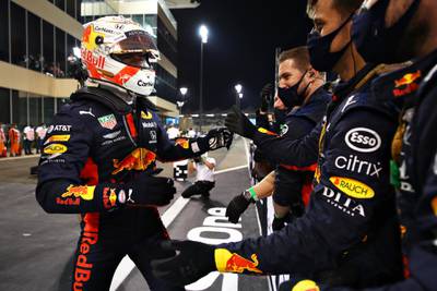 Max Verstappen celebrates with his Red Bull team after winning in Abu Dhabi. Getty