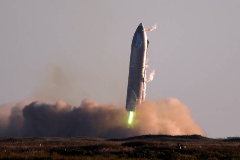 SpaceX's first super heavy-lift Starship SN8 rocket during a return-landing attempt after it launched from their facility on a test flight in Boca Chica, Texas U.S. December 9, 2020. REUTERS/Gene Blevins