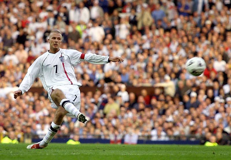 England's David Beckham scores from a free kick to equalise against
Greece in their World Cup Group Nine qualifying match at Old Trafford,
Manchester October 6, 2001. The final score was 2-2 and England
qualifies for the World Cup finals of 2002 in South Korea and Japan.
REUTERS/Darren Staples

DS/NMB