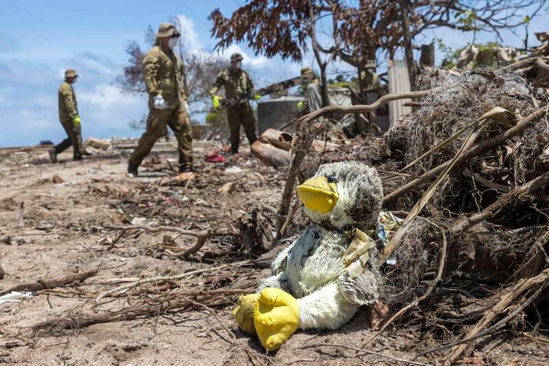 Australian Army soldiers conduct a clean-up on Atata Island, Tonga, after the Hunga Tonga-Hunga Ha’apai volcano erupted, triggering a tsunami. Photo: Commonwealth of Australia 2022, Department of Defence