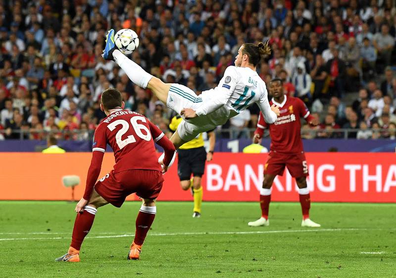 KIEV, UKRAINE - MAY 26:  Gareth Bale of Real Madrid shoots and scores his side's second goal during the UEFA Champions League Final between Real Madrid and Liverpool at NSC Olimpiyskiy Stadium on May 26, 2018 in Kiev, Ukraine.  (Photo by David Ramos/Getty Images) *** BESTPIX ***