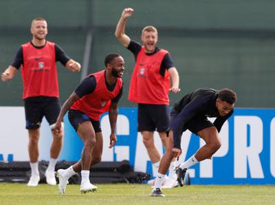 England's Raheem Sterling, Trent Alexander-Arnold and team mates during training REUTERS / Lee Smith
