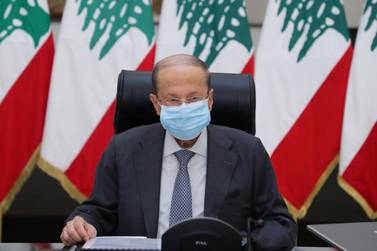 Lebanon's President Michel Aoun wearing a face mask, heads a council of ministers meeting at the presidential palace in Baabda, Lebanon. Reuters