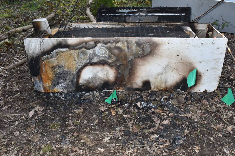A photo issued by the Metropolitan Police shows a fire-damaged fridge found near to where the body of Sarah Everard was found. PA
