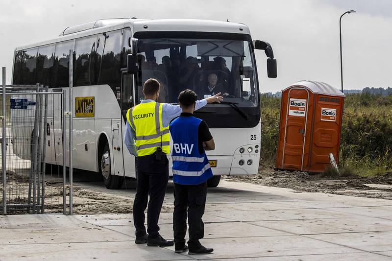 A bus transports asylum seekers from Ter Apel to an emergency shelter in Zoutkamp. AFP