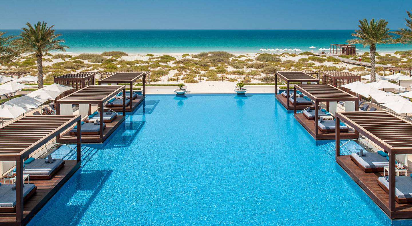 Saadiyat Beach Club offers endless ocean views and a sparkling infinity pool. Photo: Supplied 
