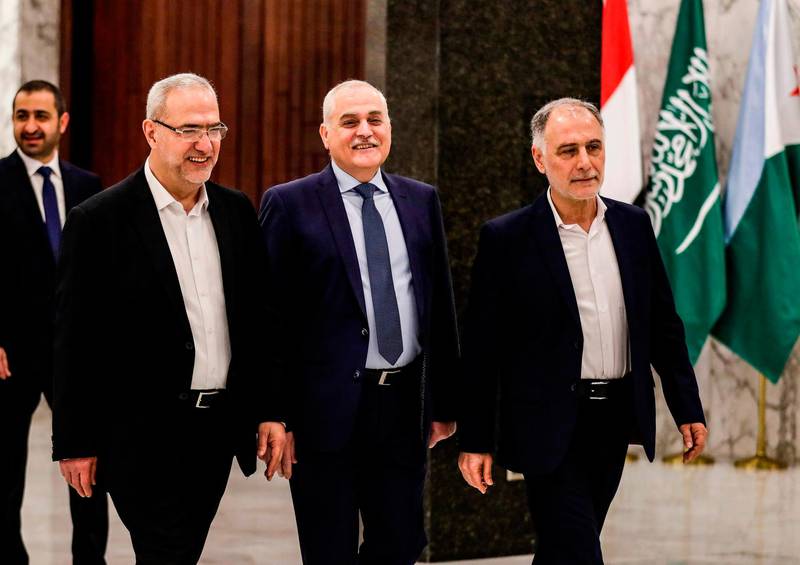 Jamil Jabak, Lebanon's new Health Minister (C) arrives with the new Youth and Sports Minister Mohamad Fneish (R) and the new Minister of State for Parliamentary Affairs Mahmoud Qmati (L) to attend the first cabinet meeting at the presidential palace in Baabda, east of the capital Beirut on February 2, 2019. Lebanon announced a government line-up on January 31, ending an eight-month wait that had heightened fears of a major economic collapse. The new cabinet, unveiled during a press conference at the presidential palace, includes 30 ministers from Lebanon's rival political clans. The new line-up is to see four women take up office, including the interior and energy ministries. / AFP / ANWAR AMRO
