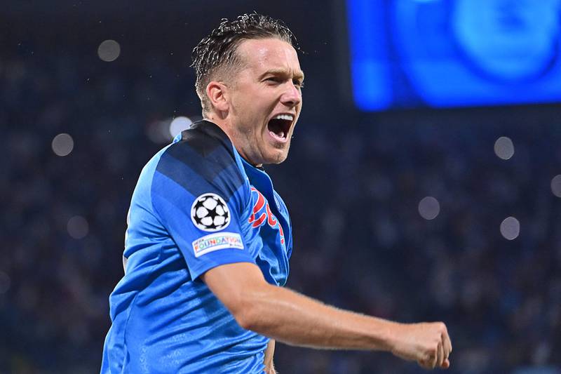 Napoli midfielder Piotr Zielinski celebrates after scoring the first in the 4-1 Champions League win against Liverpool on September 7, 2022.  AFP