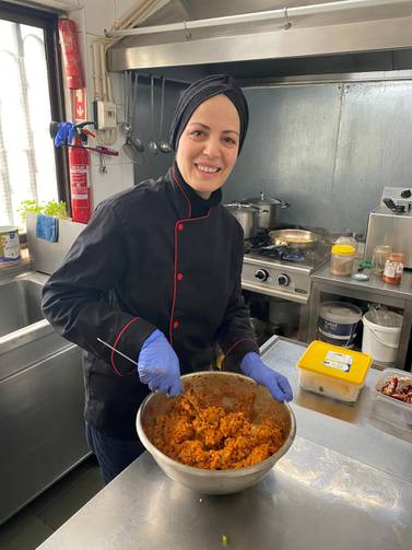 Syrian refugee Ramia Ghumim cooks food for health workers at her restaurant Tayybeh in Lisbon, Portugal April 9, 2020 Reuters   