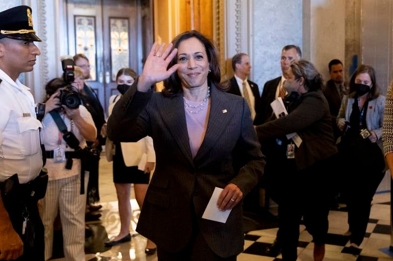 US Vice President Kamala Harris waves upon leaving the Senate chamber after the Senate passed the Inflation Reduction Act during a marathon voting session known as a 'vote-a-rama', on Capitol Hill in Washington, on August 7. EPA