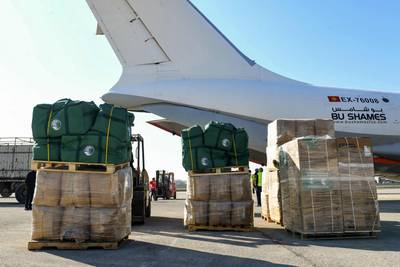 Humanitarian aid provided by Saudi Arabia for survivors of the February 6 earthquake are unloaded at Aleppo Airport in northern Syria. AFP