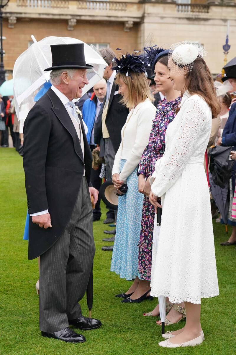 Prince Charles greets guests during the Royal Garden Party. Getty Images