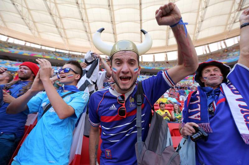 Supporters of France cheer prior to their team's match against Nigeria on Monday at the 2014 World Cup in Brasilia, Brazil. Robert Ghement / EPA