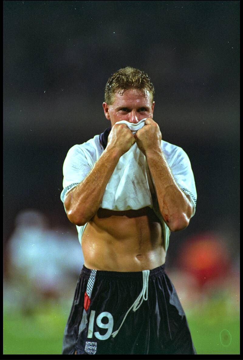 1990 World Cup, Italy. Paul Gascoigne of England is brought to tears after receiving a yellow card in the semi-final against West Germany. Had England not lost in a penalty shootout, the card would have forced Gascoigne to miss playing in the final due to the suspension it caused. Instead, West Germany beat Argentina in the final. Getty Images