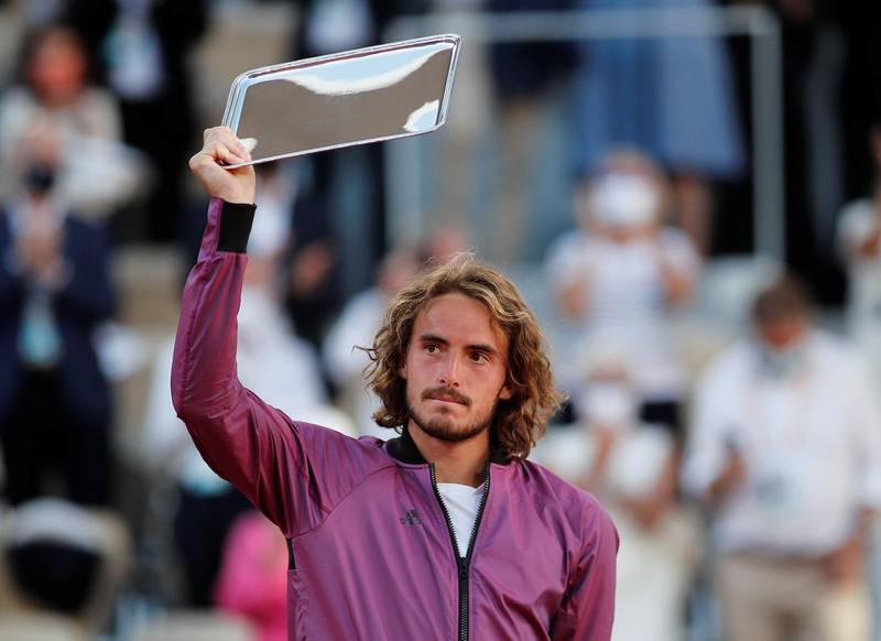 FILE PHOTO: Tennis - French Open - Roland Garros, Paris, France - June 13, 2021 Greece's Stefanos Tsitsipas poses with the runners up trophy after losing the final against Serbia's Novak Djokovic REUTERS/Benoit Tessier/File Photo