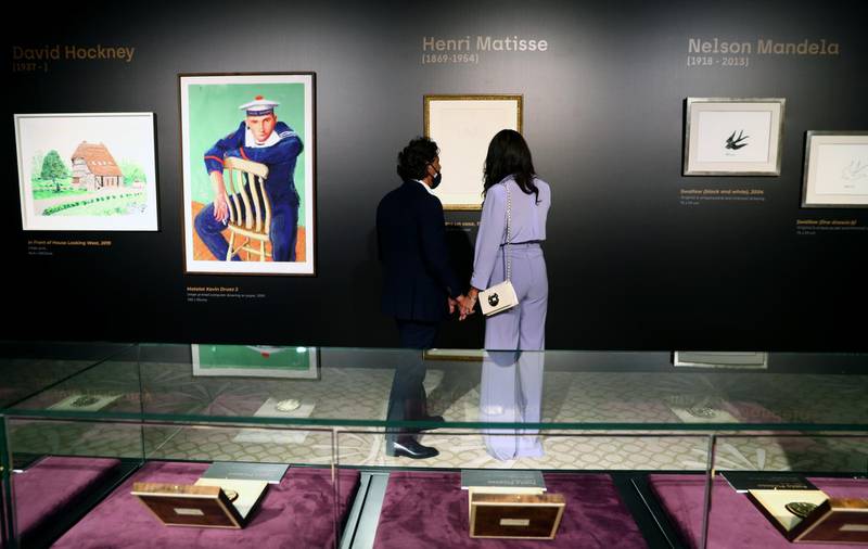 DUBAI, UNITED ARAB EMIRATES - APRIL 24:   People look at art work by Henri Matisse during the Mohammed Bin Rashid Al Maktoum's 100 Million Meals Campaign at Mandarin Oriental Jumeirah  on April 24, 2021 in Dubai, United Arab Emirates. Works by artists including Picasso, Hockney, Miro and Matisse will be auctioned at a private event to raise money in the Mohammed Bin Rashid Al Maktoum's 100 Million Meals Campaign to end hunger during the Muslim holy month of Ramadan. (Photo by Francois Nel/Getty Images)