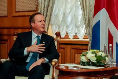 Mr Cameron during the meeting with Mr Shmyhal. Reuters