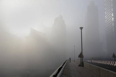 Dubai, United Arab Emirates, Mar 06, 2014 - Early morning fog at Dubai Marina. ( Jaime Puebla / The National Newspaper ) Focal Point