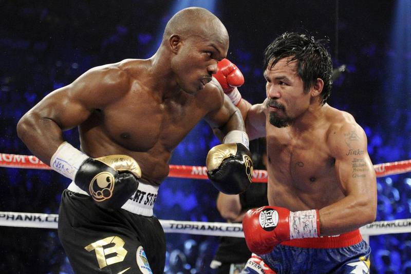 Manny Pacquiao and Timothy Bradley, during their last fight in 2012. Chris Carlson / AP