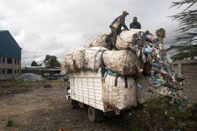 A load of plastic waste is taken to a recycling and repurposing factory in Athi River town, Kenya. AFP