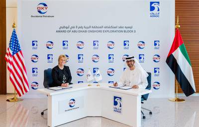 Dr Sultan Al Jaber, ADNOC Group CEO, and Vicki Hollub, CEO of Occidental signing documents. Courtsey: Adnoc

