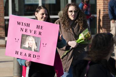 Tiffany Lunn, a supporter of Depp, outside the court in Fairfax, Virginia.  AP