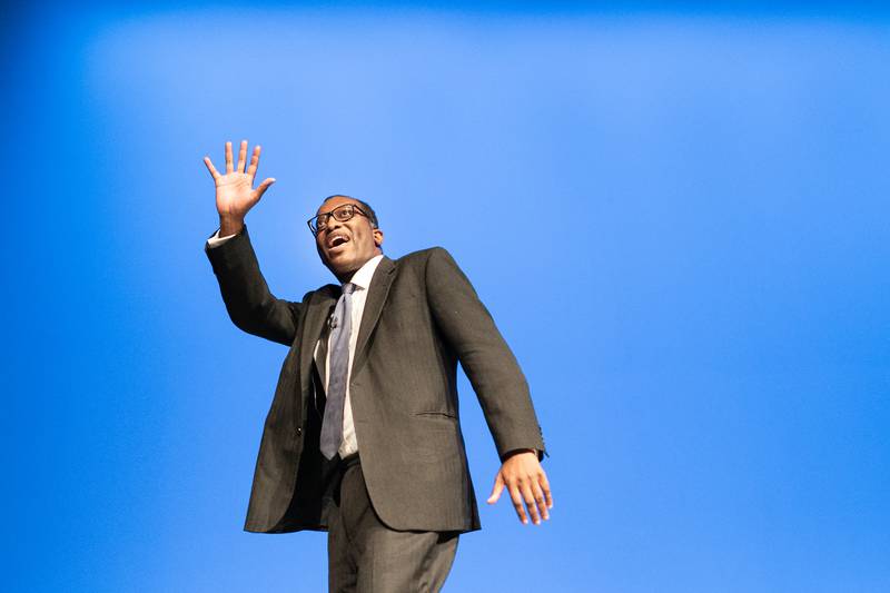Mr Kwarteng leaves the stage after delivering his keynote speech to party members at the annual Conservative Party conference in Birmingham. PA