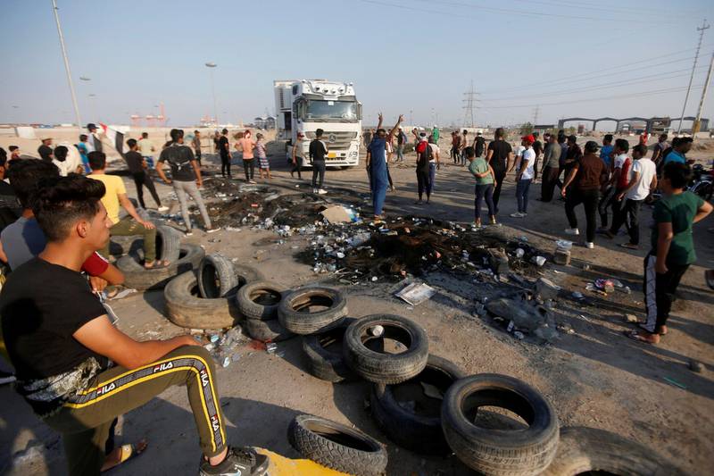 Iraqi protesters gather as they block the entrance of Umm Qasr Port, during ongoing anti-government protests, south of Basra, Iraq November 3, 2019. REUTERS/Essam al-Sudani