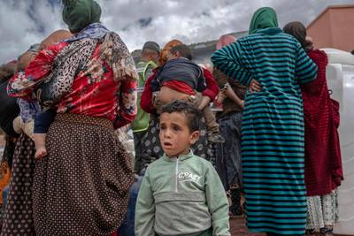 Survivors wait to receive assistance in Morocco's Atlas Mountains following a powerful earthquake earlier this month. AFP
