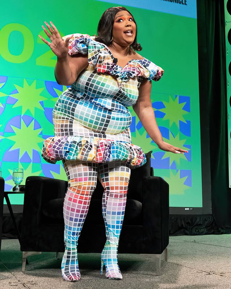 Lizzo in a multi-coloured fitted body suit in Austin, Texas, on March 13, 2022. AFP