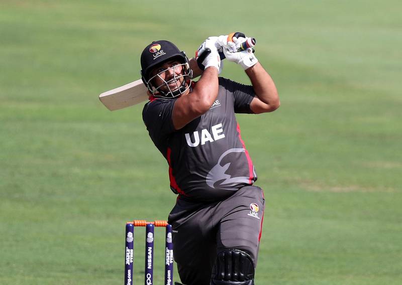 Dubai, United Arab Emirates - October 14, 2019: The UAE's Ashfaq Ahmed hits out during the ICC Mens T20 World cup qualifier warm up game between the UAE and Scotland. Monday the 14th of October 2019. International Cricket Stadium, Dubai. Chris Whiteoak / The National