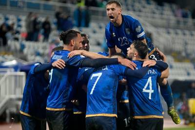 Kosovo players celebrate their 1-0 victory over Israel. AFP