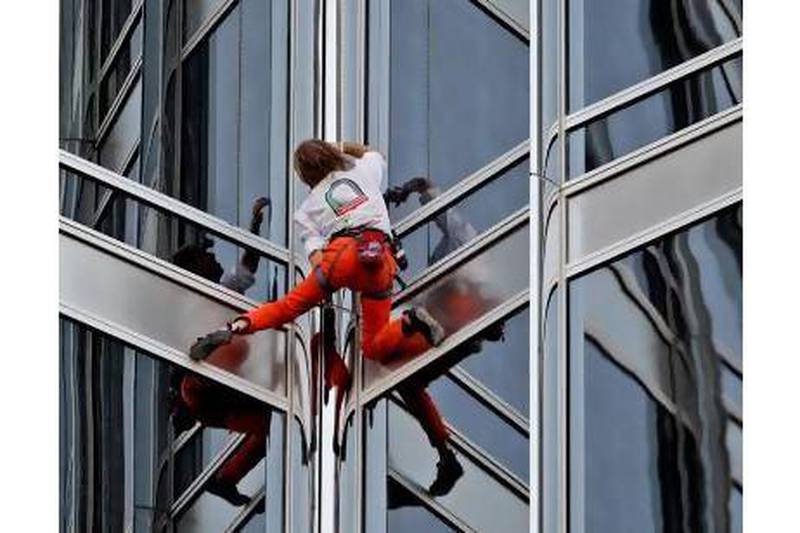 Alain Robert, who scaled the Burj Khalifa in 2011, has a challenge for the UAE's Saaed Al Memari. Kamran Jebrell / AP