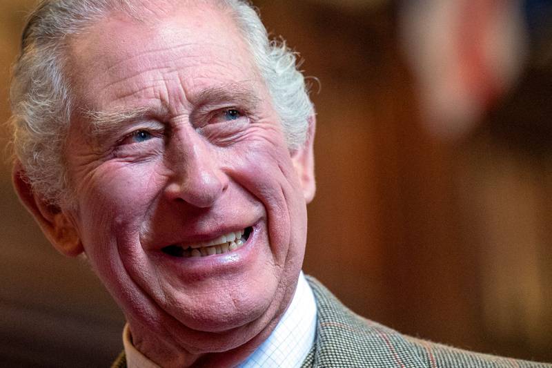 The death of his mother, Queen Elizabeth II, has rung in the Carolean era, or the reign of Britain's King Charles III, another of the words of the year.  AFP