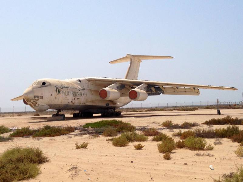 An Ilyushin 76 Russian-made cargo plane, once owned by former arms dealer Victor Bout, sits in a lot on the site of the old Umm Al Quwain airfield. John Dennehy / The National
