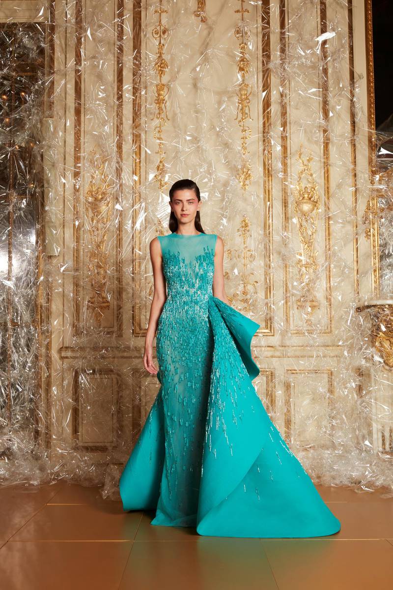 A turquoise beaded gown