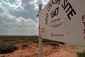 A sign in 1997 near Roswell, New Mexico, where in 1947, debris was recovered from what many claimed was a flying saucer. AP