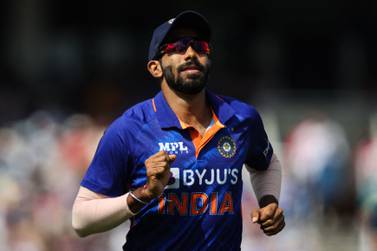 (FILES) In this file photo taken on July 14, 2022, India's Jasprit Bumrah reacts during the Second Royal London One Day International (ODI) cricket match between England and India at the Lord's cricket ground in London.  - India's pace spearhead Bumrah was on October 3, 2022 ruled out of the Twenty20 World Cup in Australia starting later this month with a back injury, the country's cricket board said.  (Photo by ADRIAN DENNIS / AFP) / RESTRICTED TO EDITORIAL USE.  NO ASSOCIATION WITH DIRECT COMPETITOR OF SPONSOR, PARTNER, OR SUPPLIER OF THE ECB