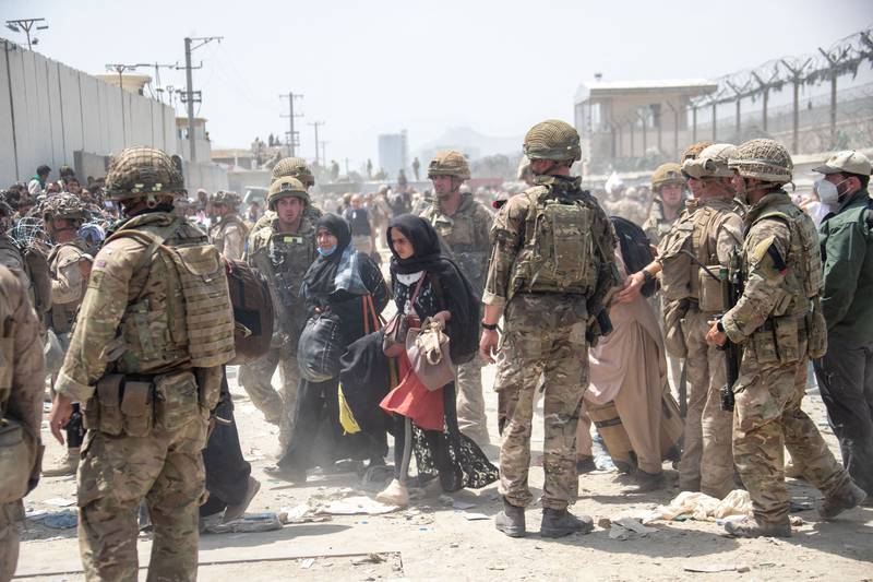 British and US armed forces working at Kabul Airport. MOD/AFP