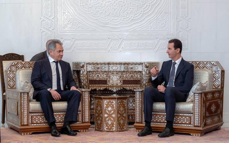 epa07448905 A handout photo made available by the official Syrian Arab News Agency (SANA) shows Syrian President Bashar Assad (R) meeting with the Russian Defense Minister Sergey Shoygu (L), Damascus, Syria, 19 March 2019. According to SANA, Assad said the Russian-Syrian coordination, especially in the military and political domains, were one of the decisive factors of Syrias steadfastness in the face of terrorism.  EPA/SANA HANDOUT  HANDOUT EDITORIAL USE ONLY/NO SALES