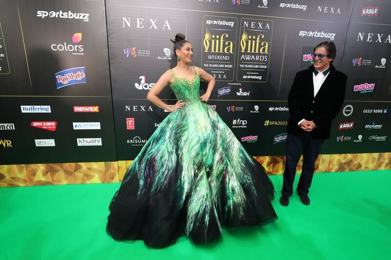 Bollywood actors Nargis Fakhri and Chunkey Pandey on the green carpet at the IIFA Awards 2022 at Etihad Arena in Abu Dhabi. Chris Whiteoak / The National