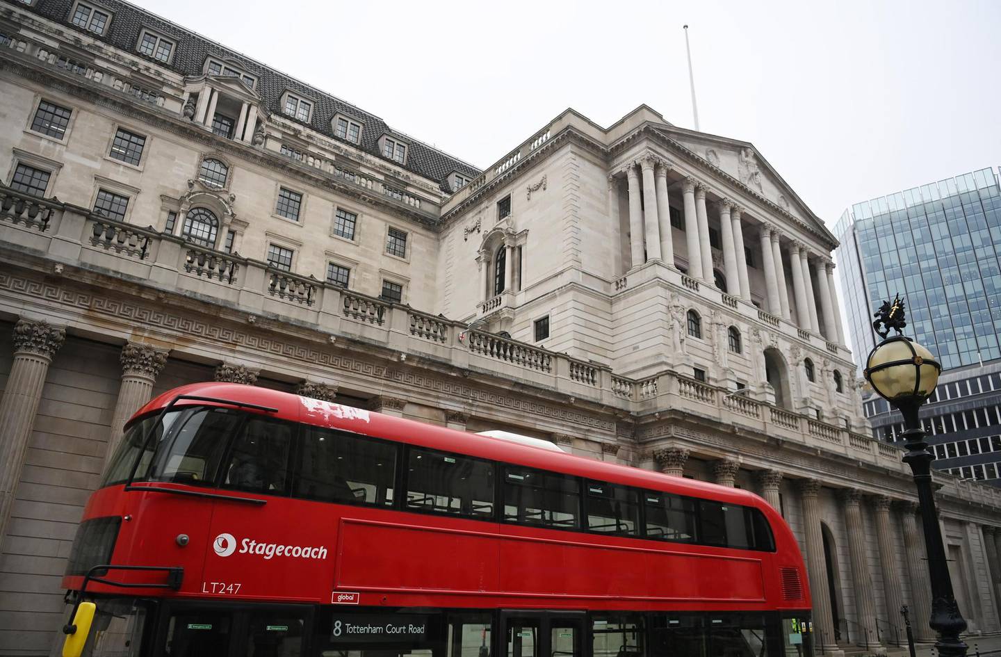 epa09046251 A bus passes the Bank of England in London, Britain, 02 March 2021. Britain's Chancellor of the Exchequer Rishi Sunak will deliver his budget on 03 March 2021. His statement to MPs in the House of Commons outlines the state of the economy and the government's plans for raising or lowering taxes. It also includes forecasts for how the UK economy could perform in future.  EPA/NEIL HALL